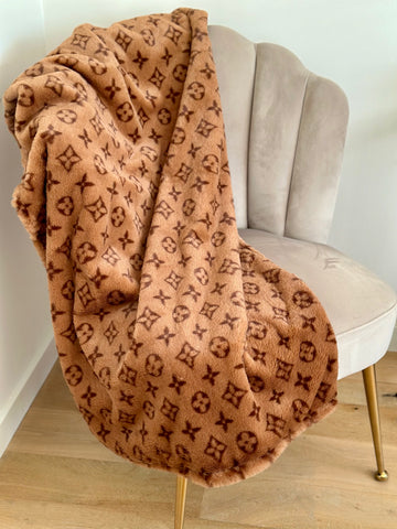Zachte deken met bruine print